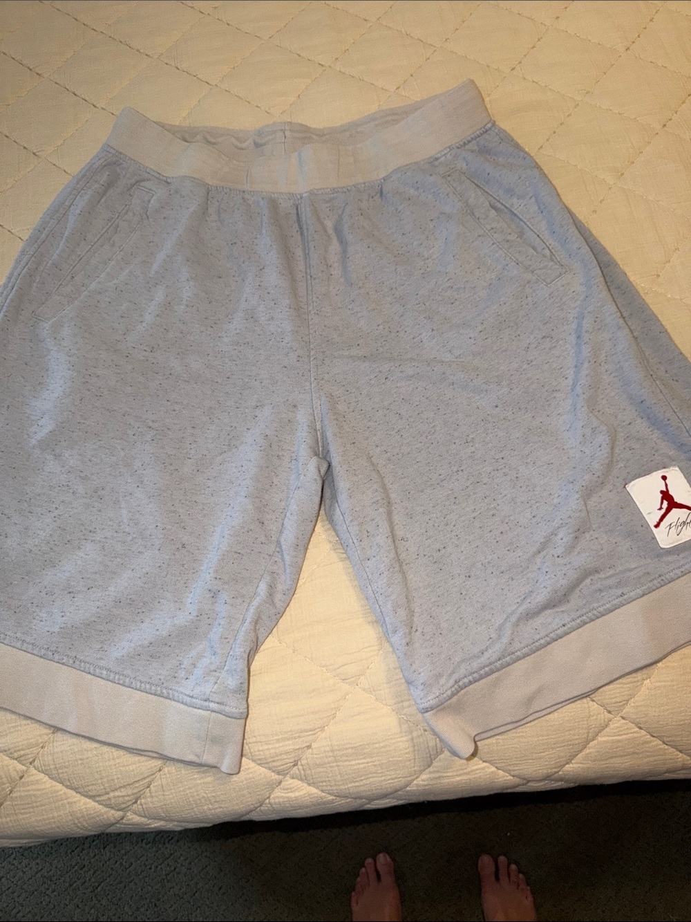 Jordan Men’s Light Heather Gray Athletic Shorts with Red Jumpman Badge